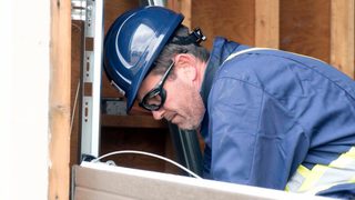 CDS technician installing garage door cable