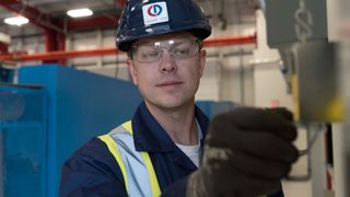 CDS technician installing pedestrian door component