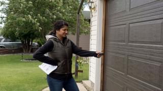 Homeowner opening garage using smart remote