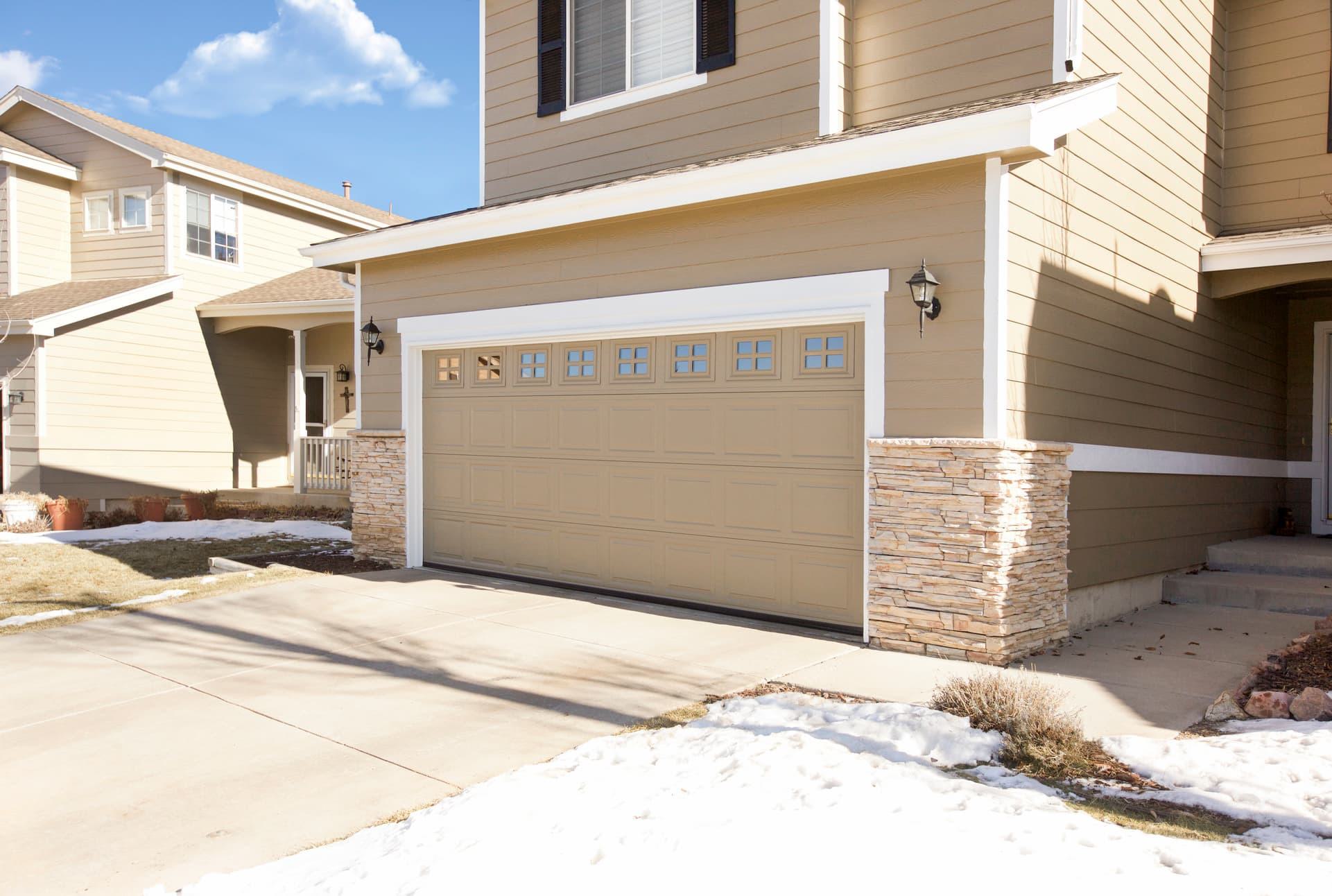 Wayne Dalton Model 8300-8500 garage door in snow