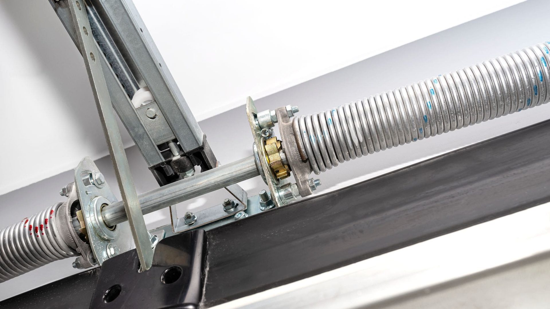 Guide to Commercial Door Torsion Spring Repair and Replacement ...