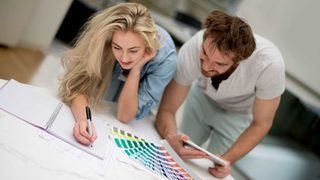 Couple Choosing Paint Colours Min