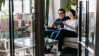 Couple Using Tech Min