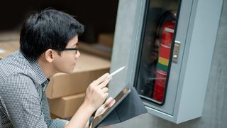 Hero Checking Fire Extinguisher Min