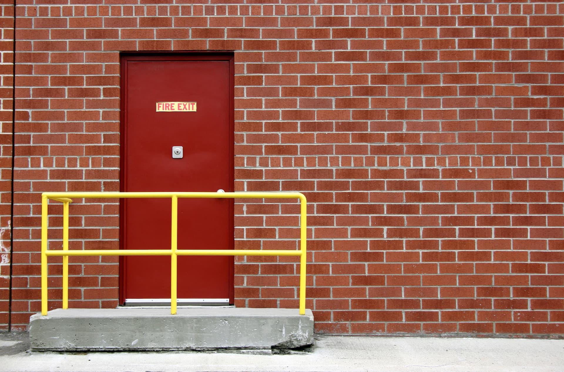 red fire exit pedestrian door