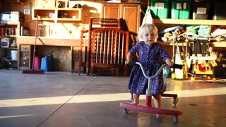 Safety Child Playing In Garage
