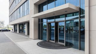 Sliding automatic doors for office building entrance