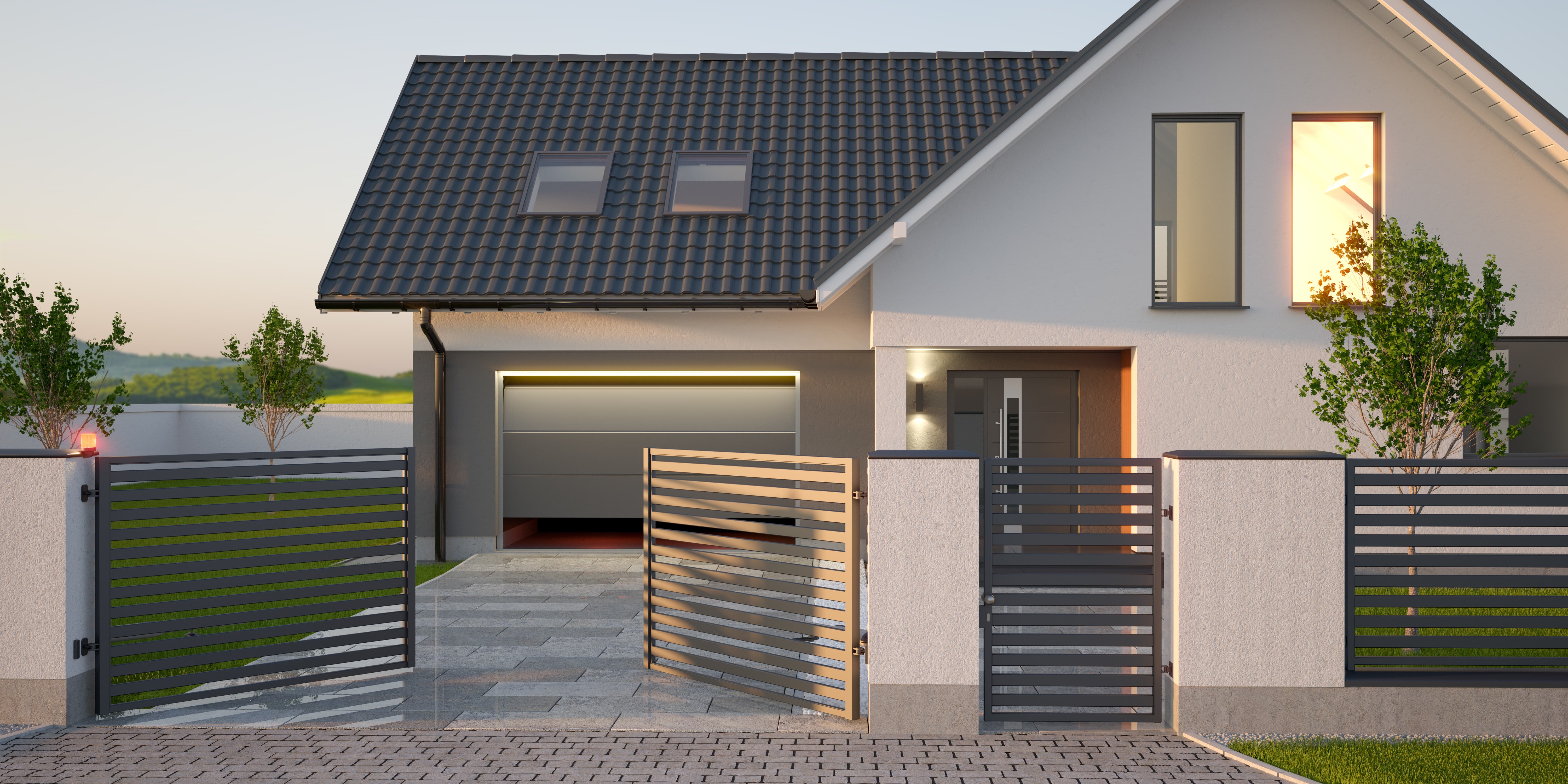 automatic swing gates for modern home at sunset