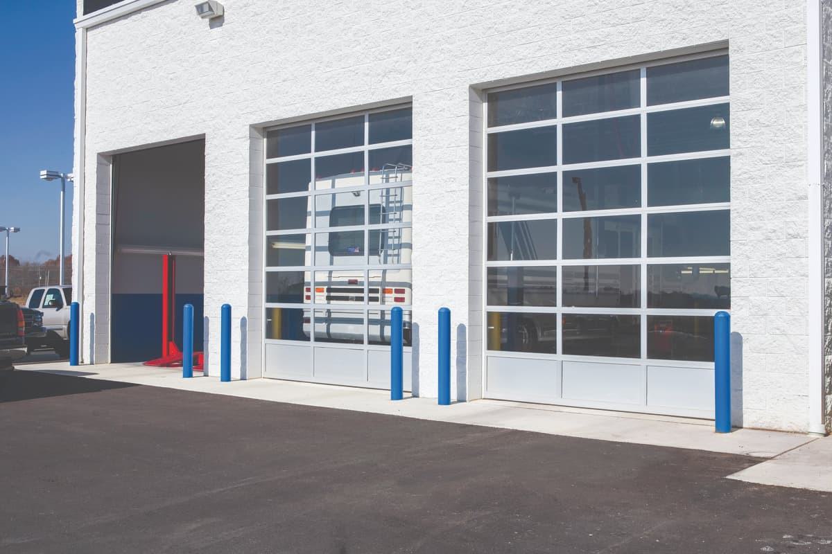 automotive facility with aluminum sectional doors