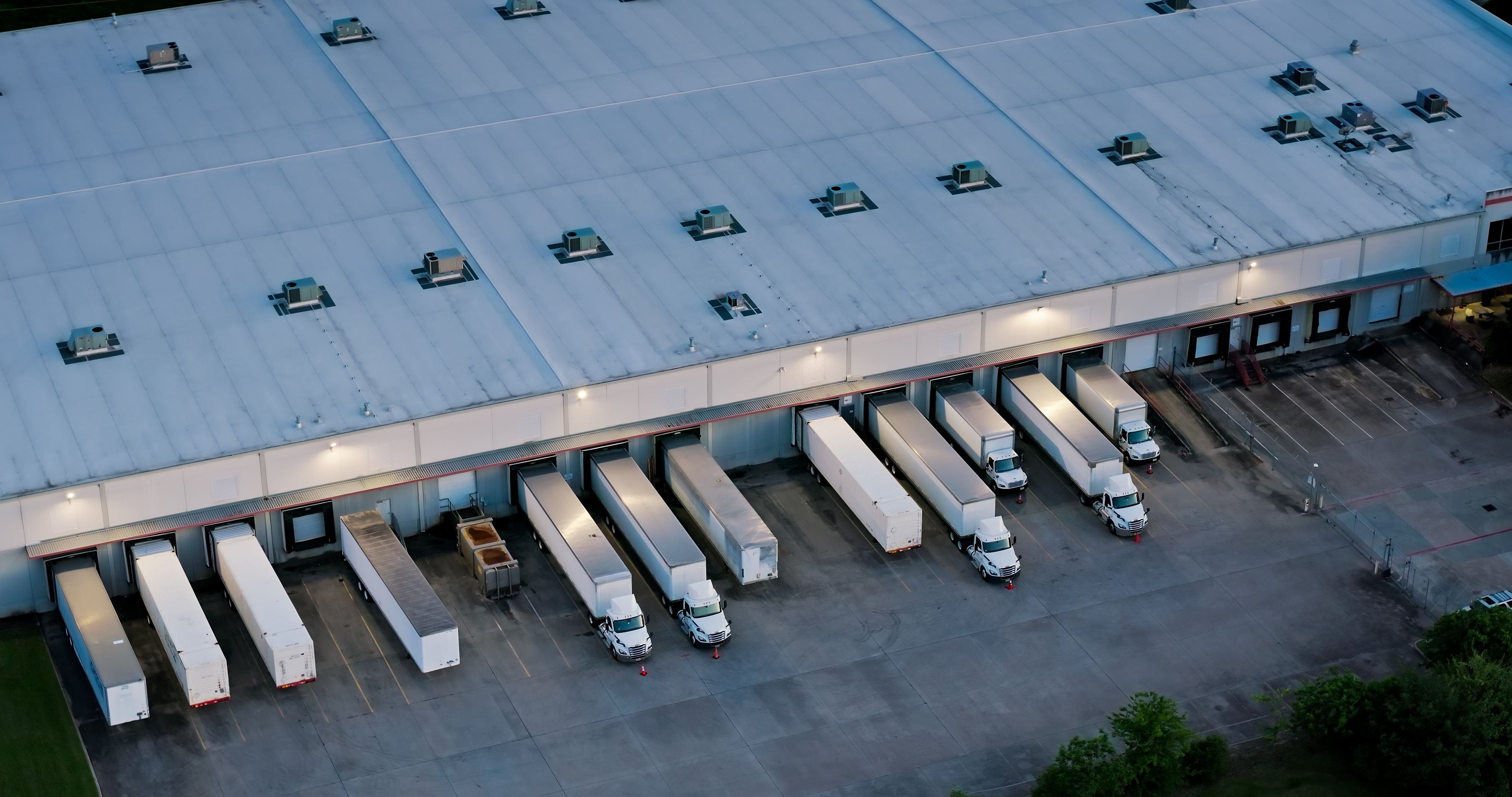 Aerial view of distribution centre and trucks