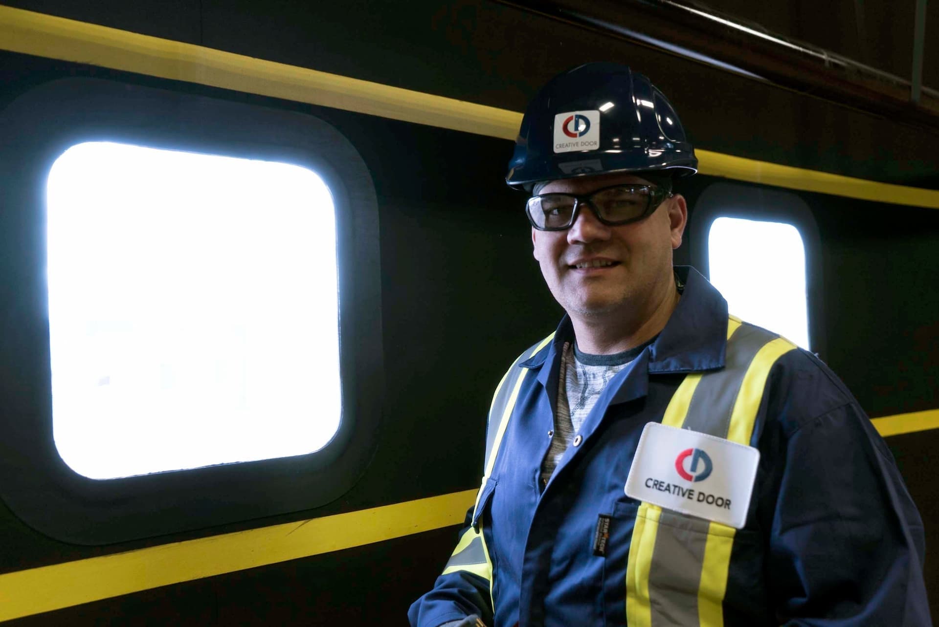 Creative Door Services repair technician for warehouse and dock equipment