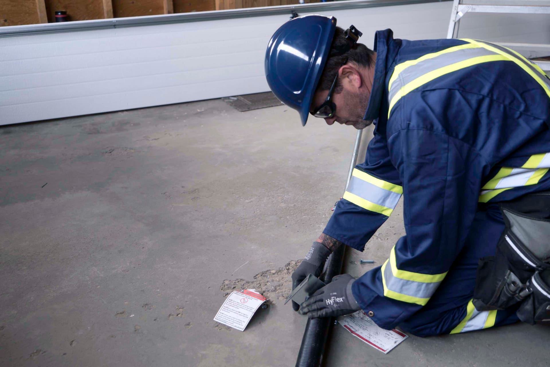 CDS technician preparing to install garage door spring