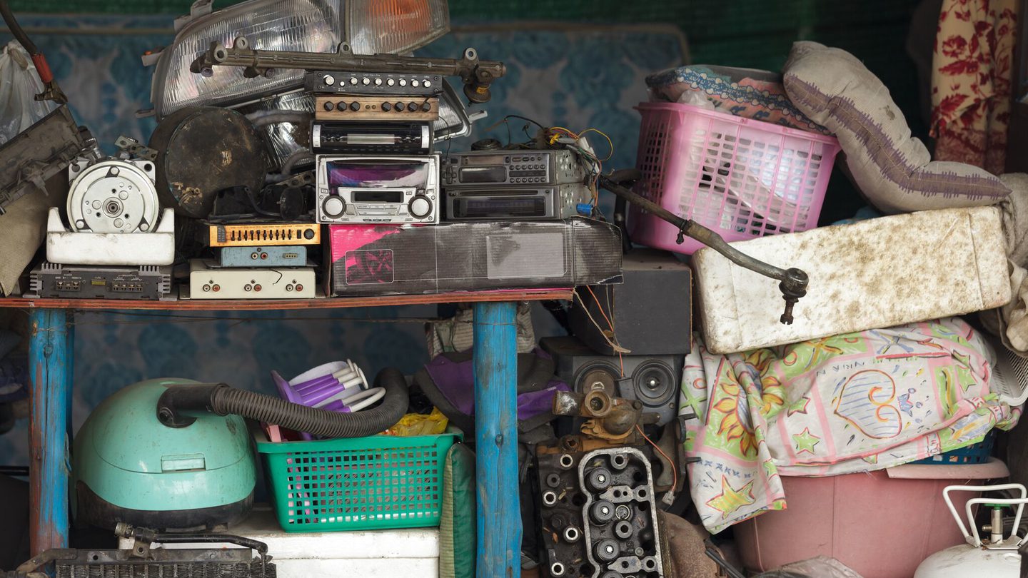 Creative-Door-Services_Cool-Storage-Tips_cluttered-garage.jpg?mtime=20180927103343#asset:10174:c1440x810