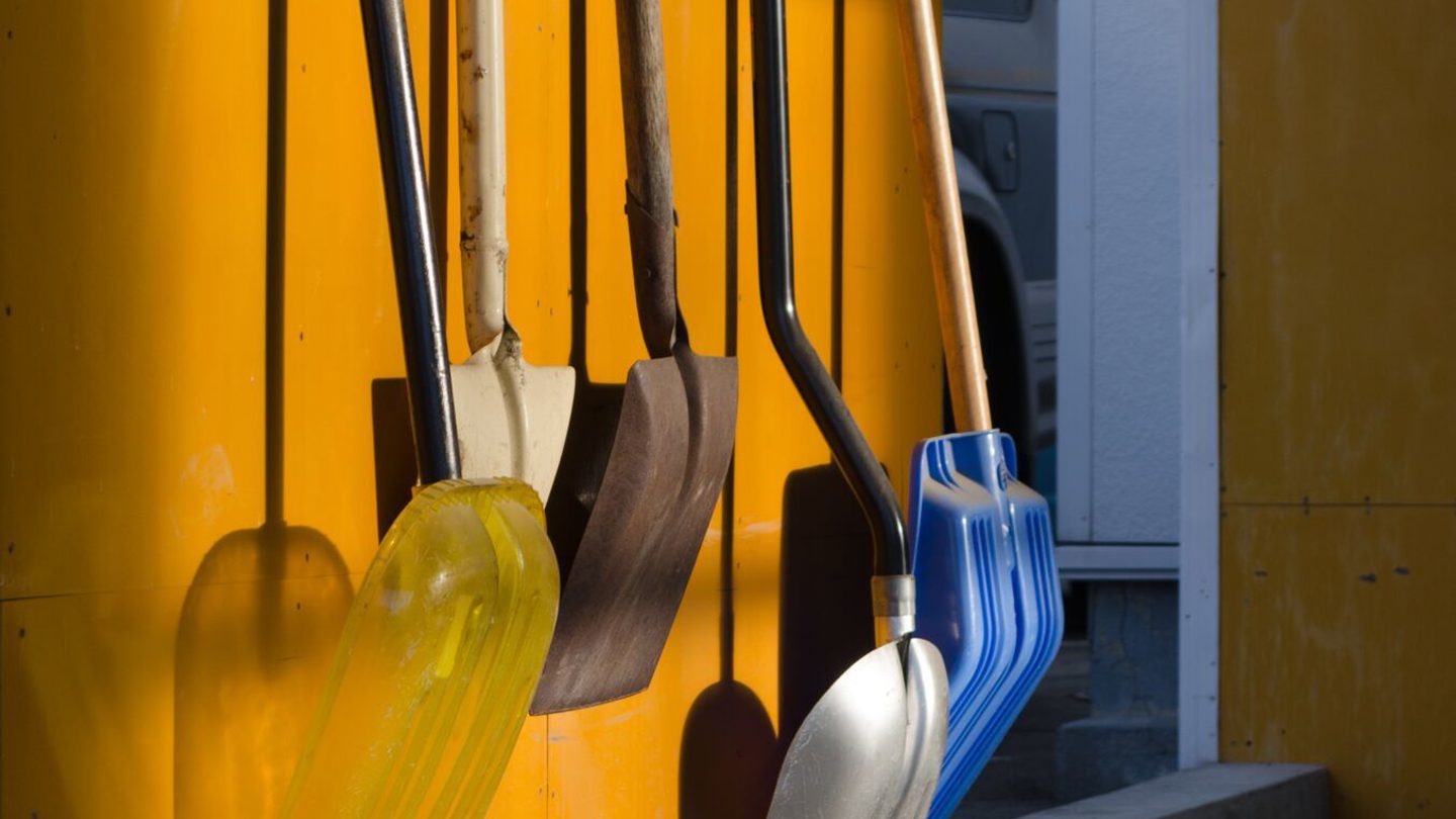 Creative-Door-Services_Cool-Storage-Tips_shovels-hung-up-on-garage-wall.jpg?mtime=20180927103437#asset:10175:c1440x810