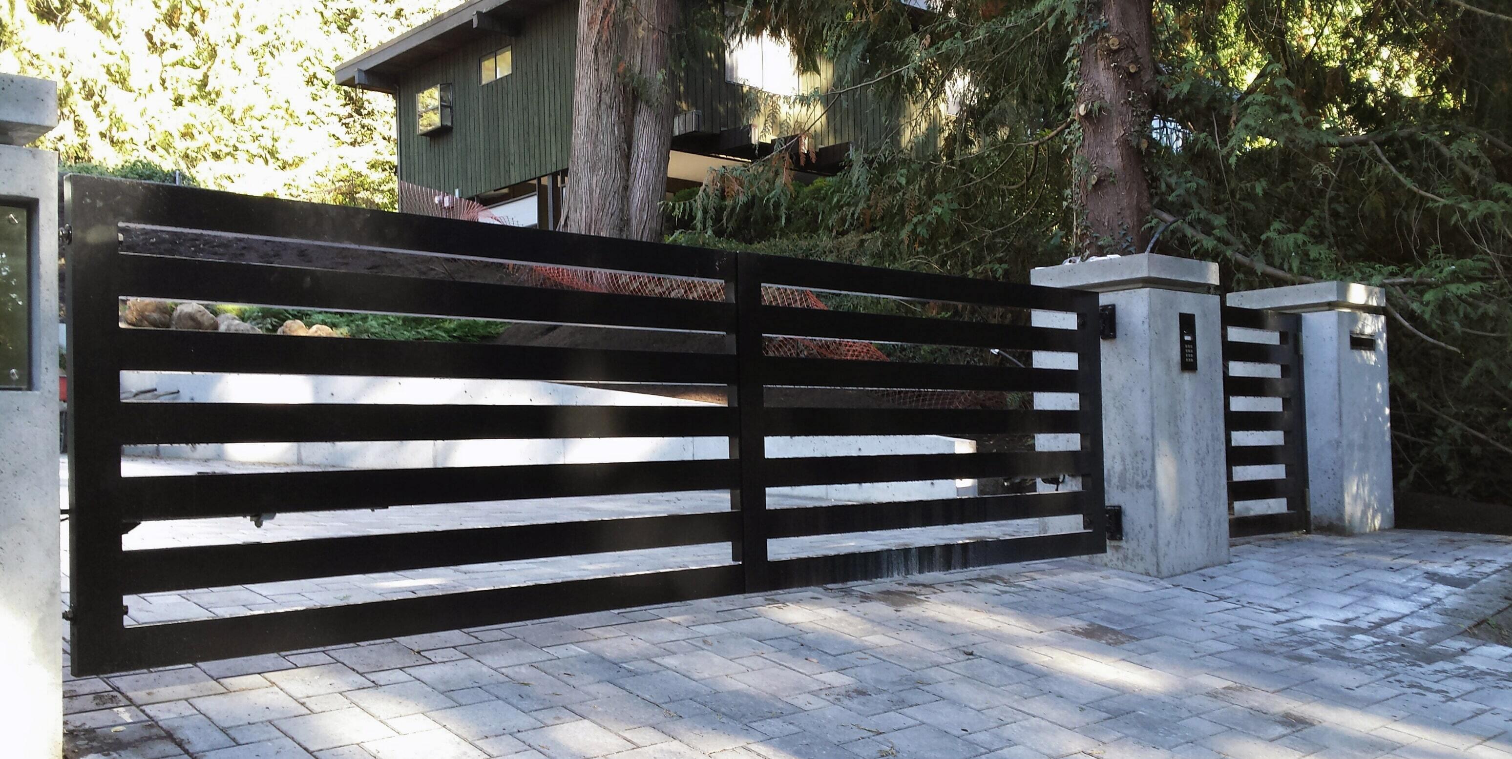 Aluminum driveway gate and matching pedestrian gate