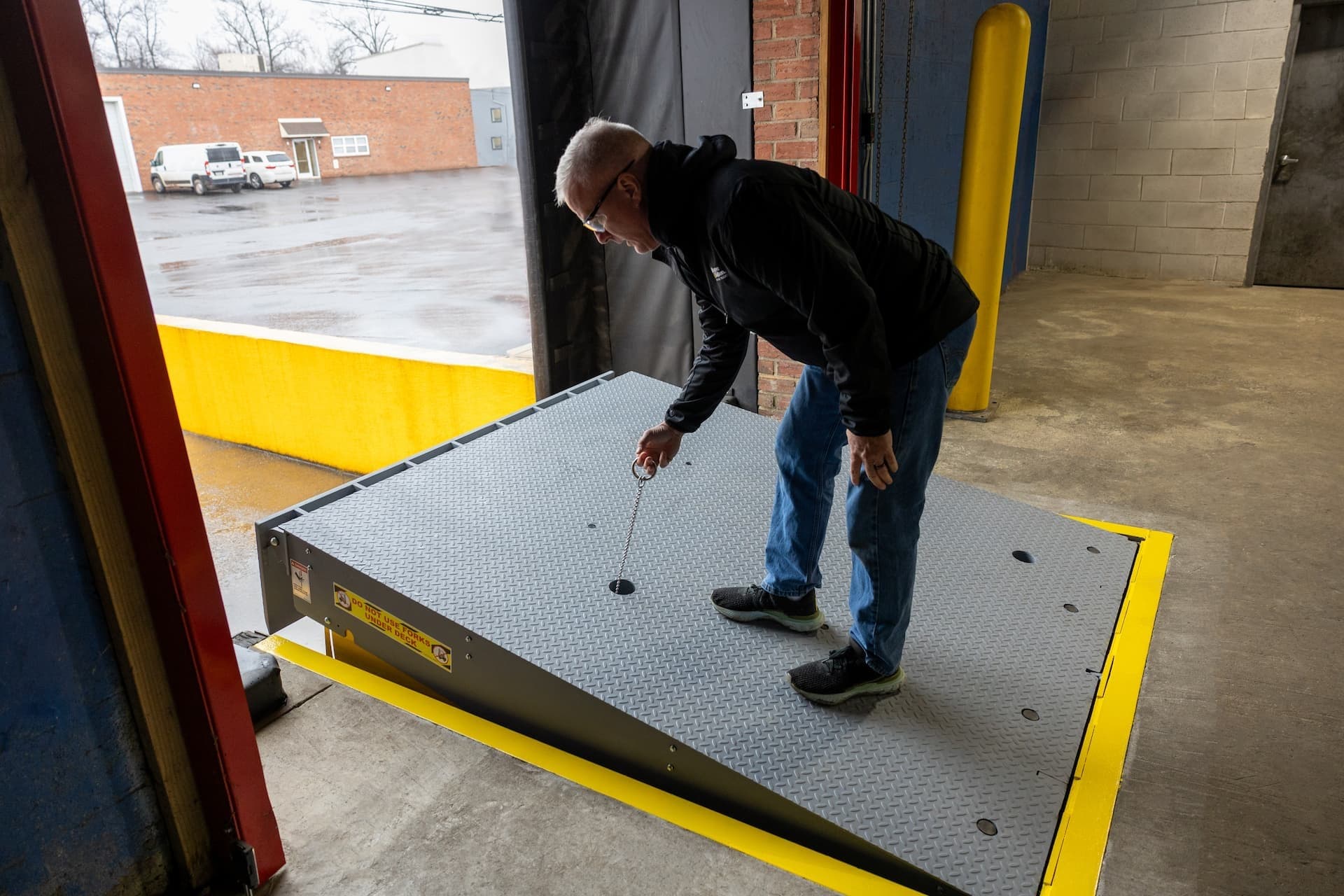 Dalton Dock mechanical pit leveler release chain