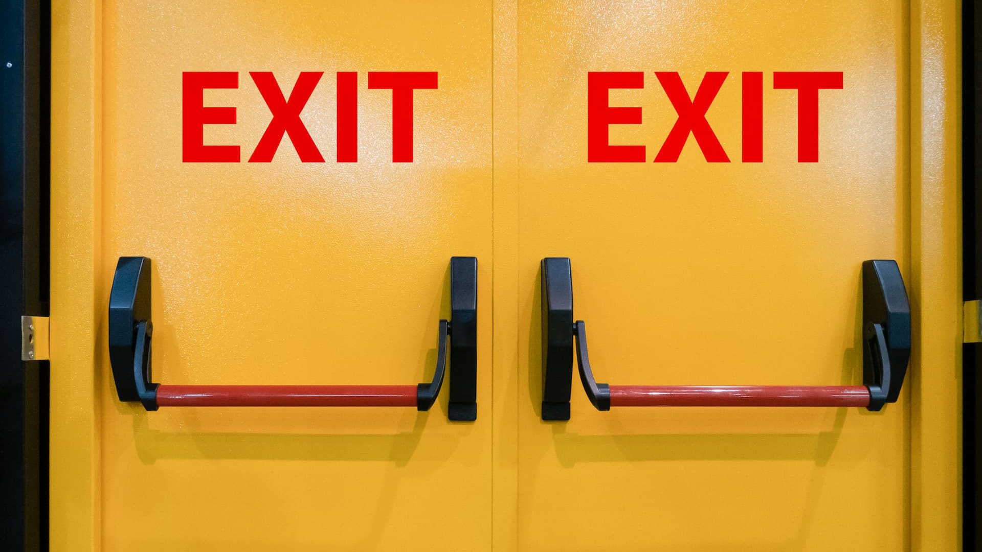 Emergency exit doors with panic bars