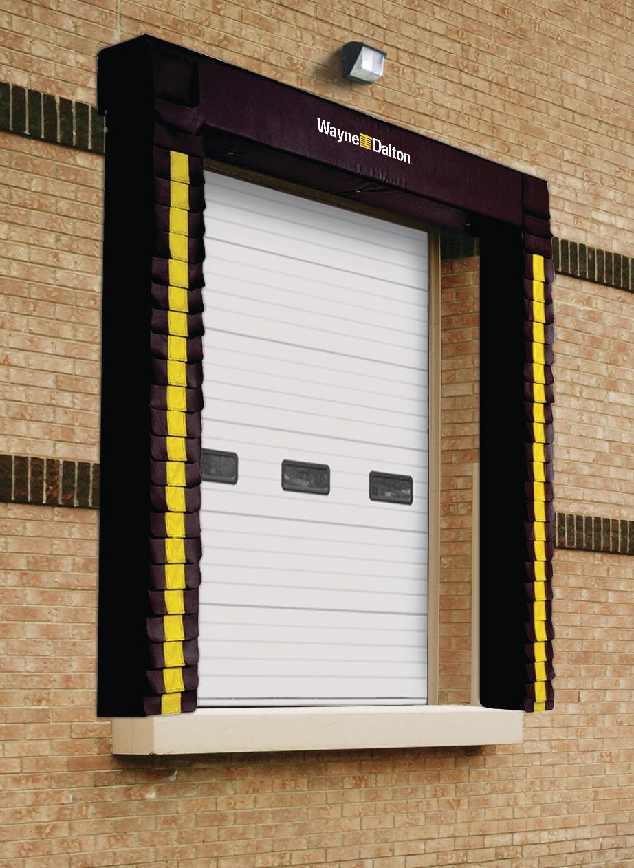 Fixed dock seal installed around a commercial loading dock door for trailer protection and sealing