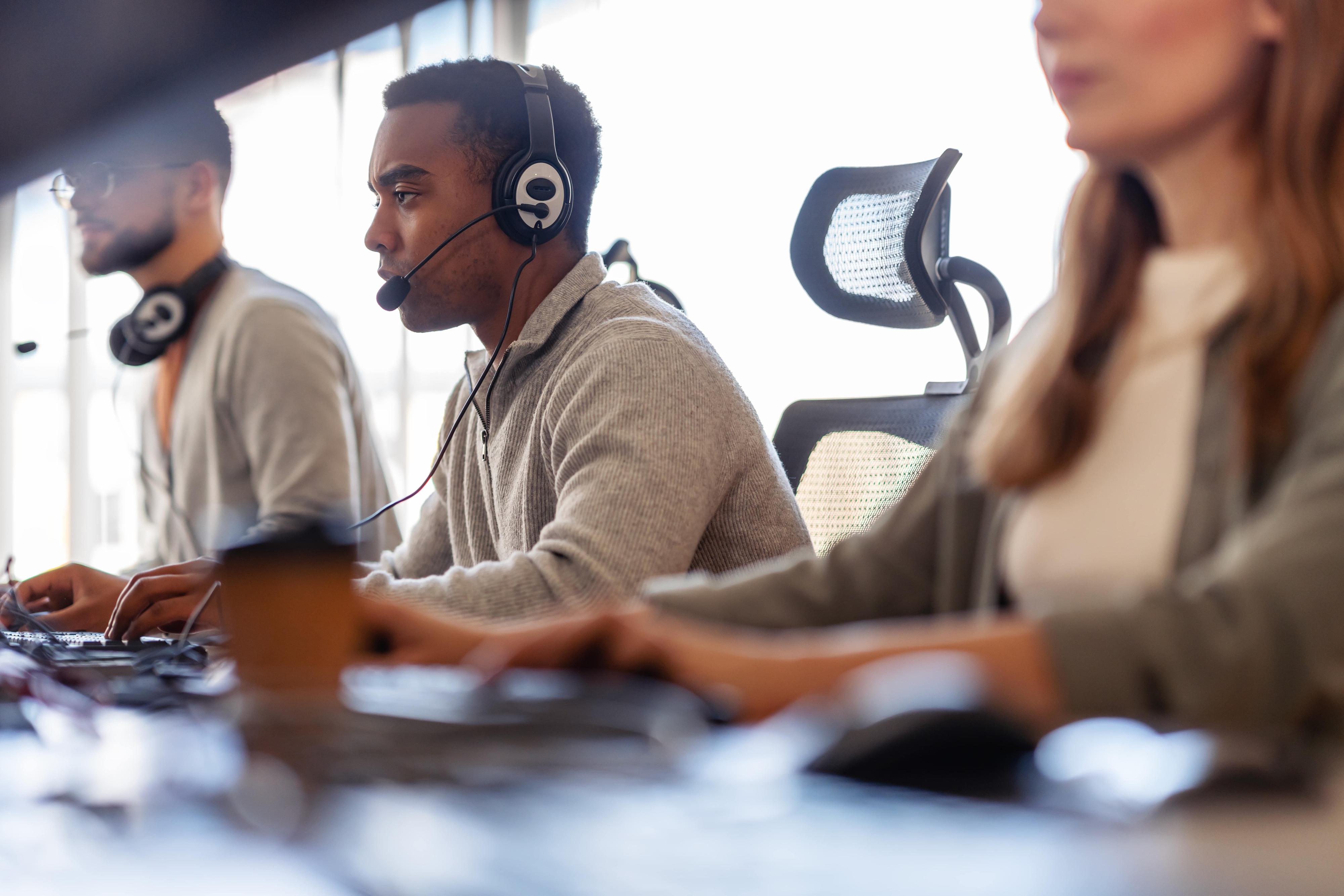 Open concept office with headsets