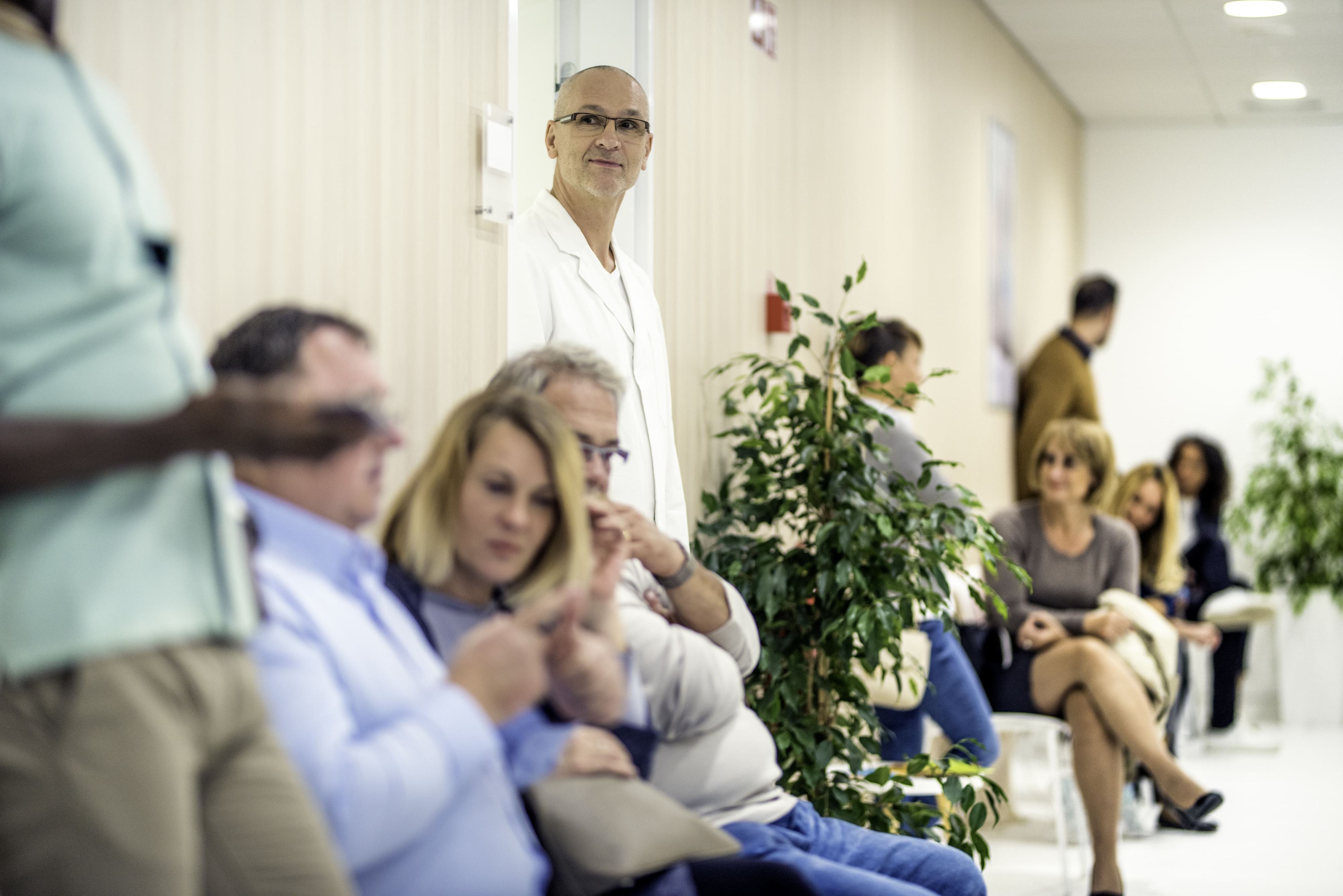 Patient waiting area that is very busy and bustling