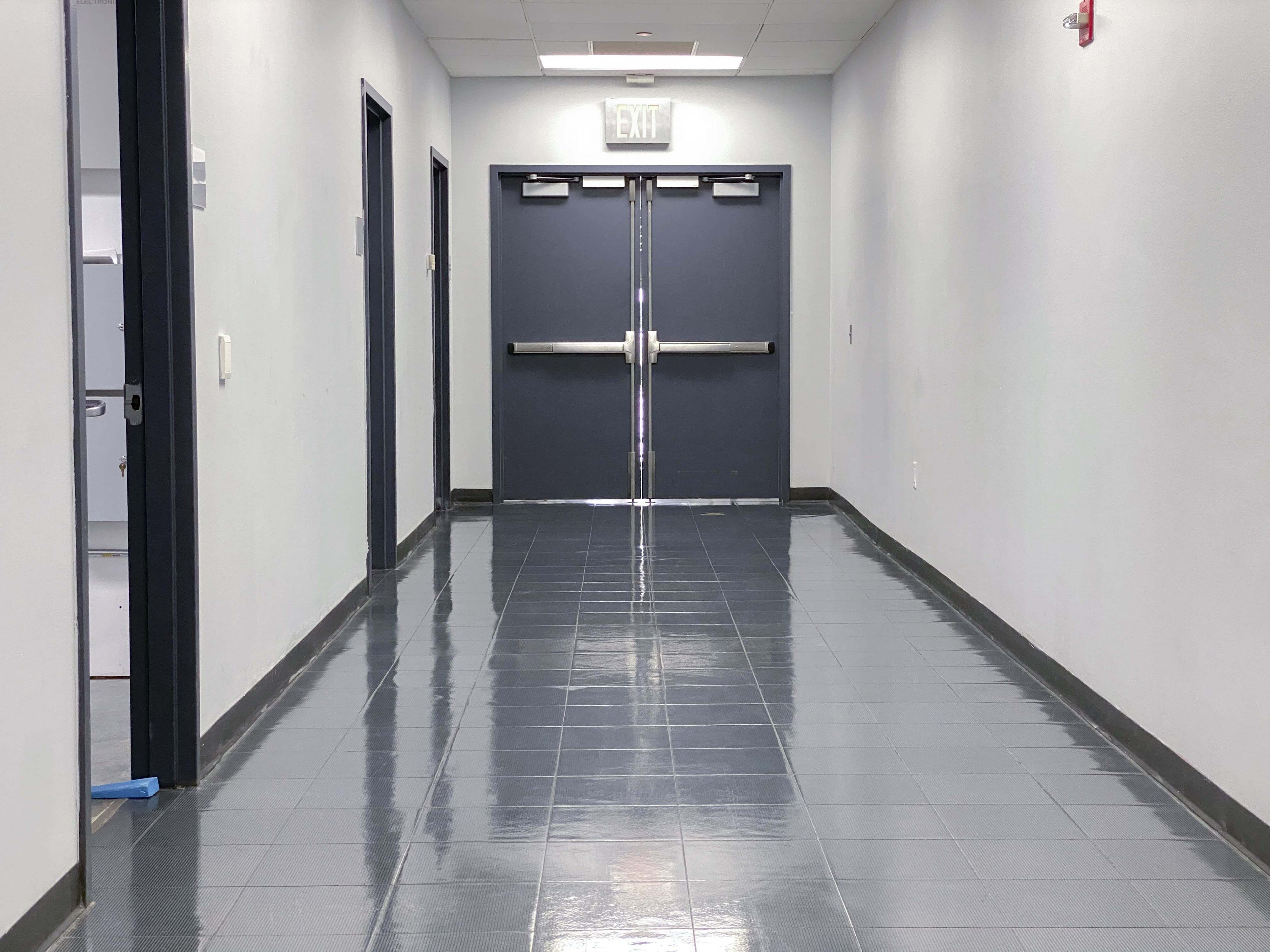 hospital corridor with grey exit doors