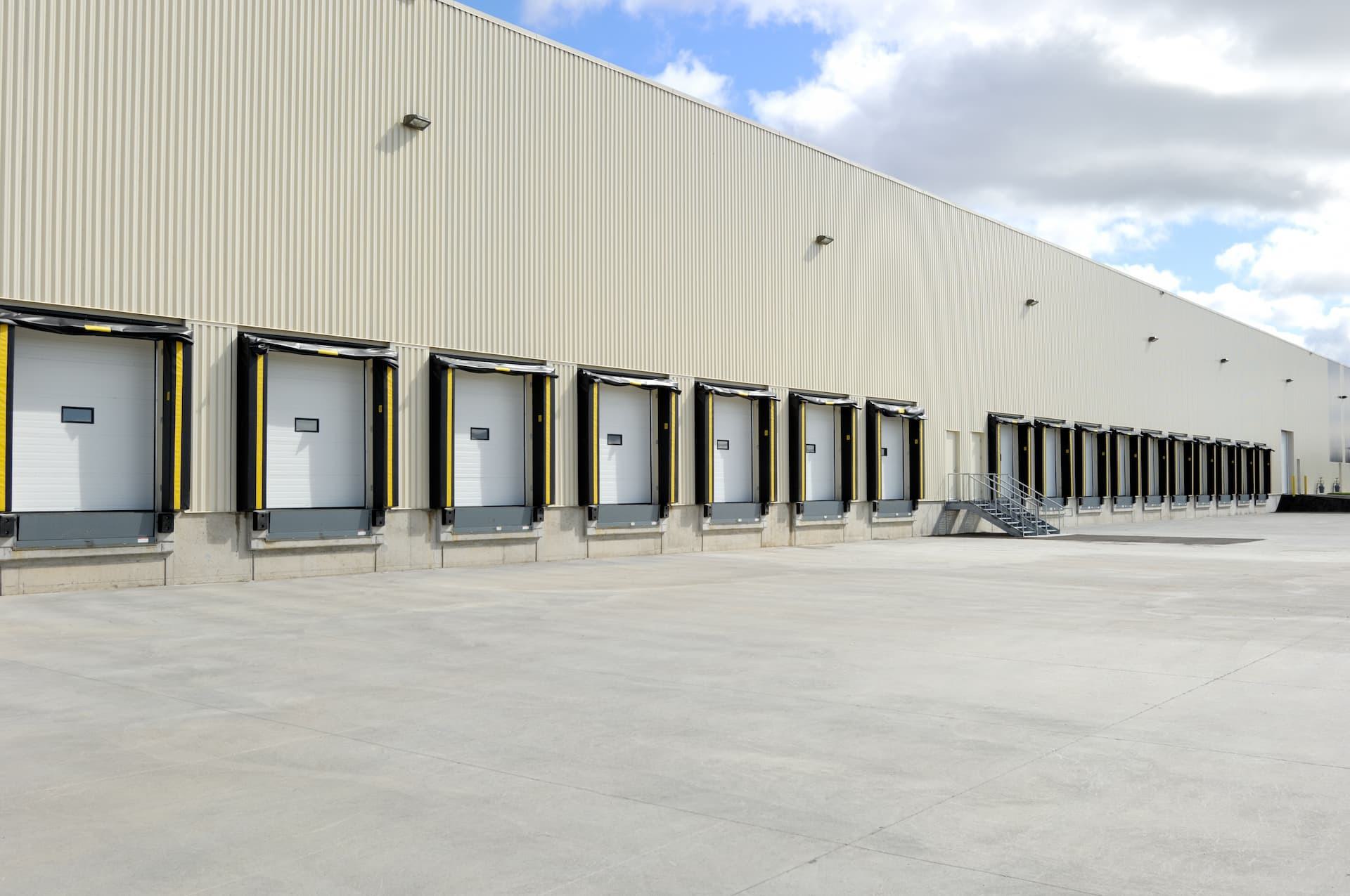Multiple loading dock doors at large warehouse facility