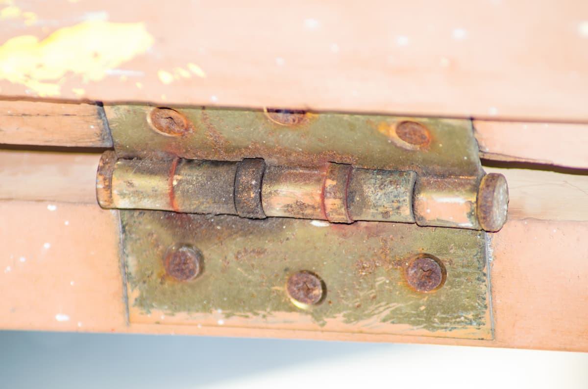 Rusty old garage door hinge