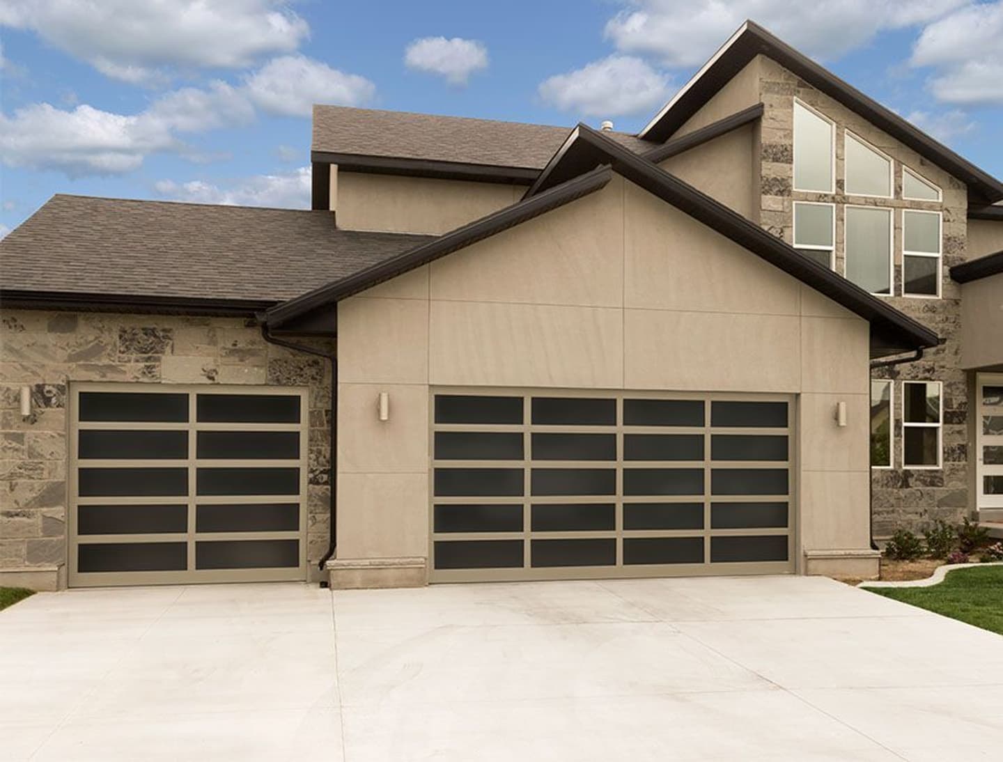 brown-modern-house-with-front-driveway-and-dark-brown-modern-garage-doors.jpg?mtime=20181123164436#asset:10859:c1440xauto