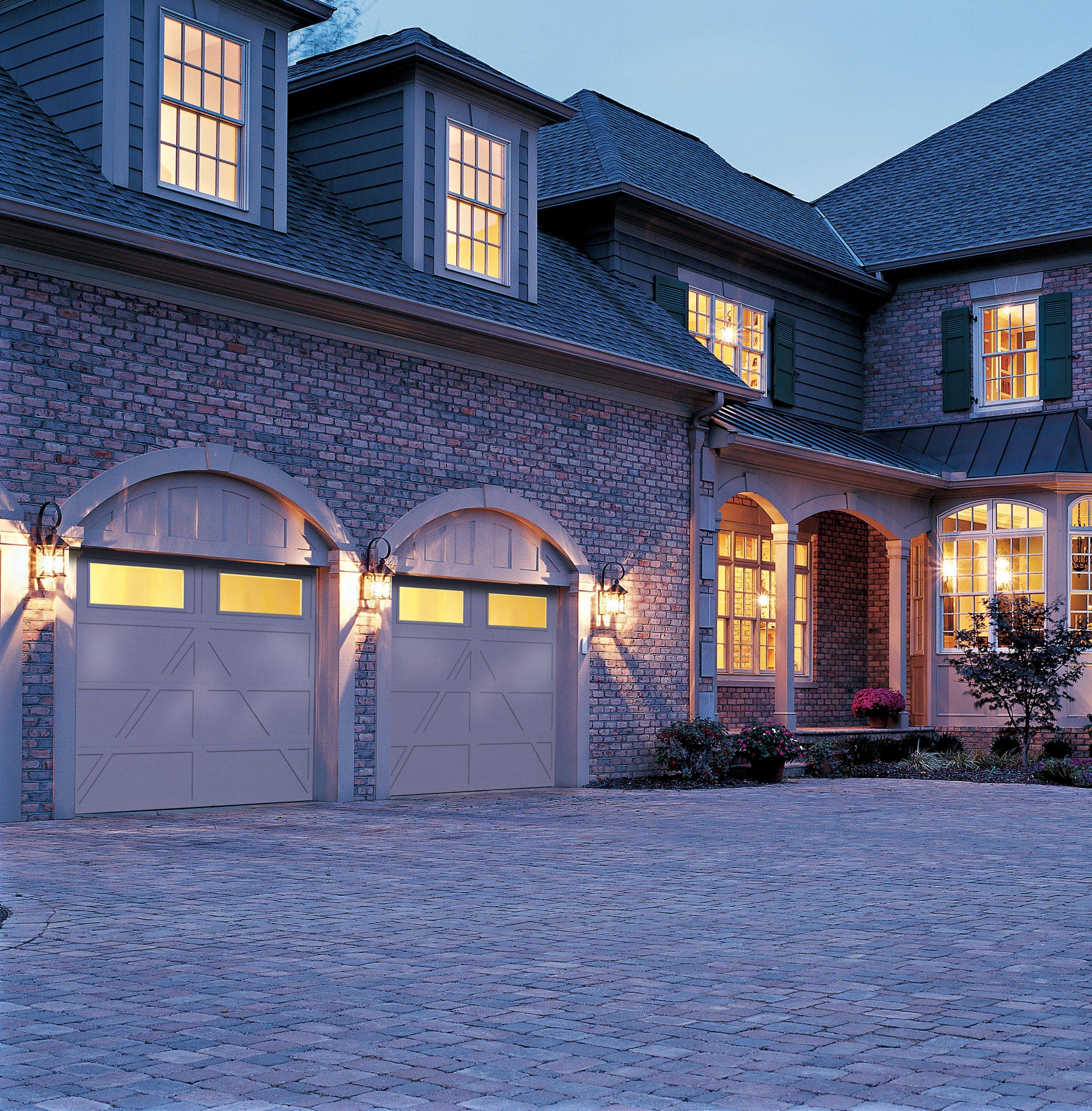 wayne dalton garage doors lit up at night