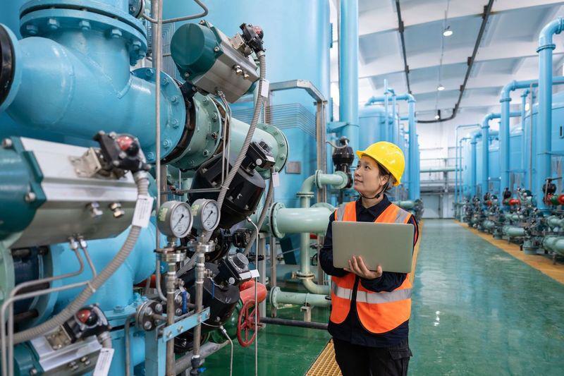 chemical plant worker inspection