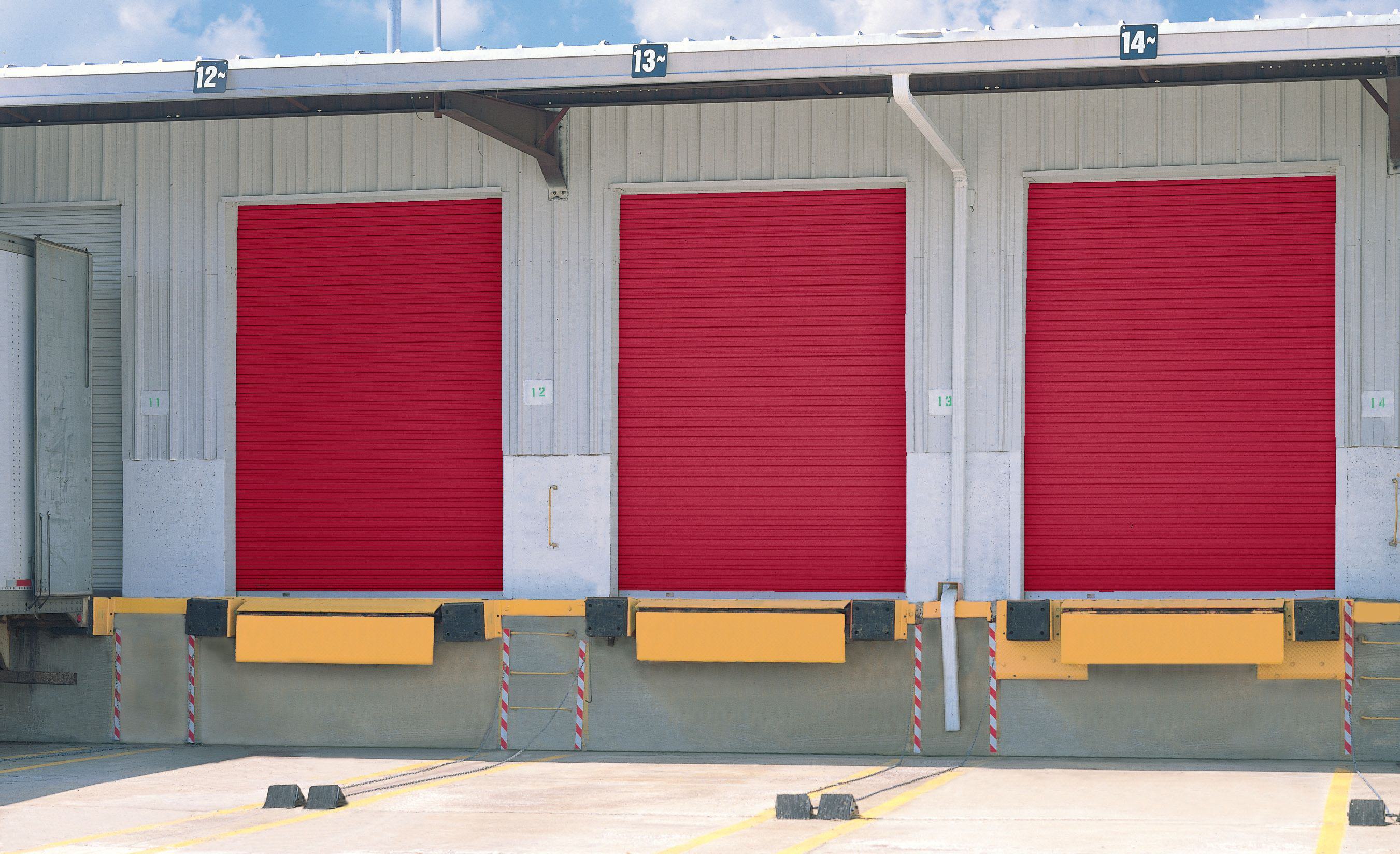 red commercial rolling doors for warehouse docking bay by Wayne Dalton