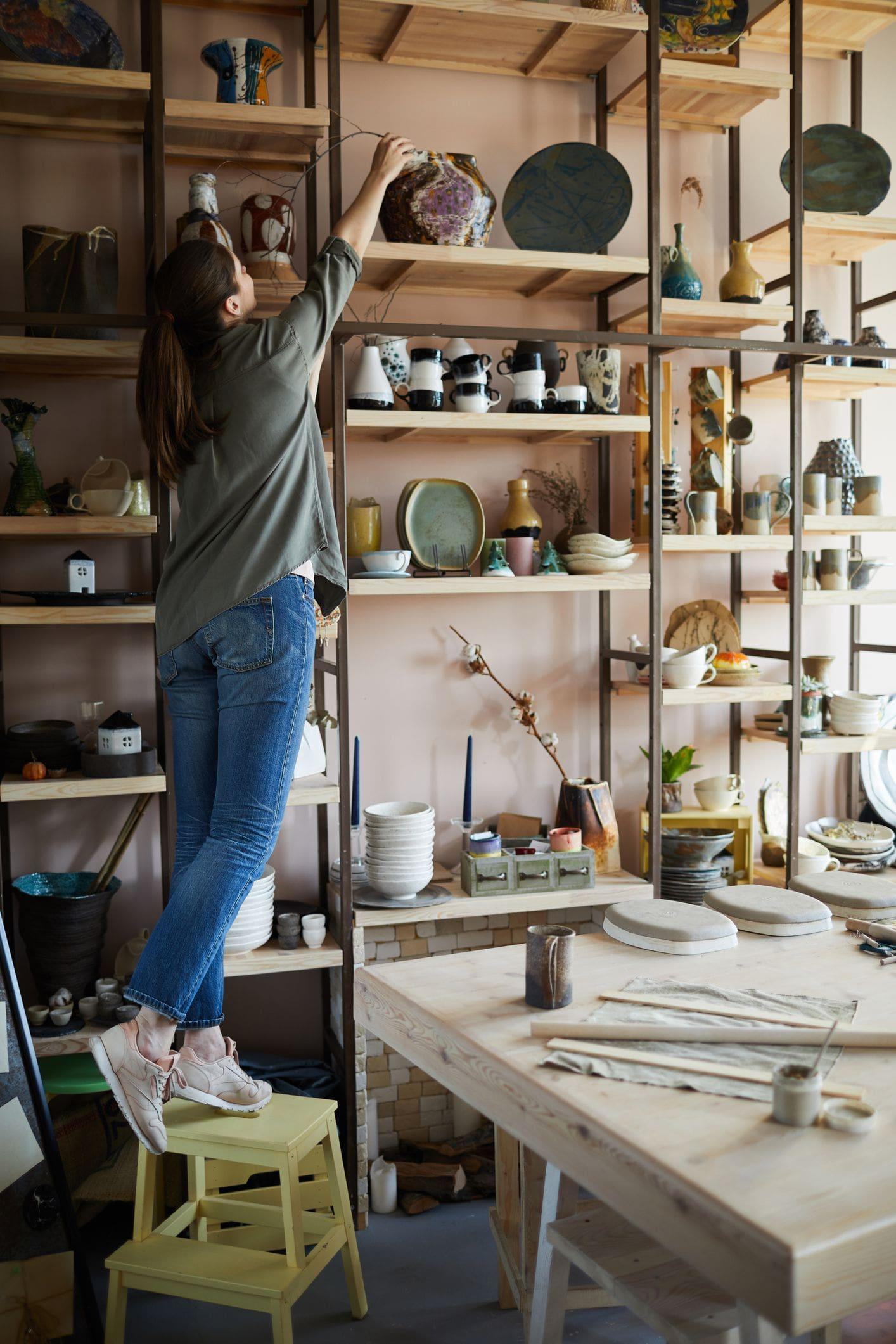 custom shelving display in tandem garage workshop