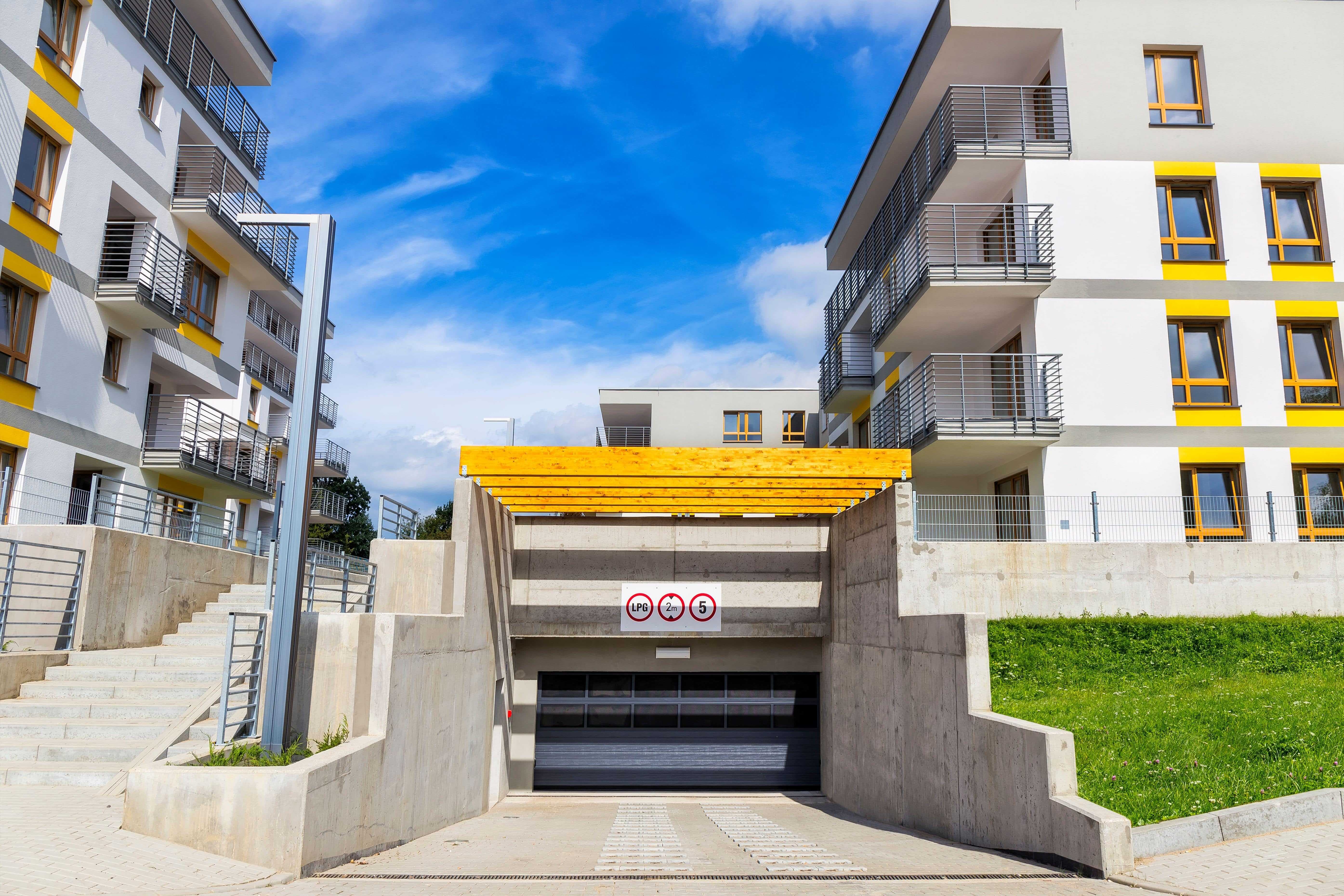 bright and modern parking garage entrance for condo complex