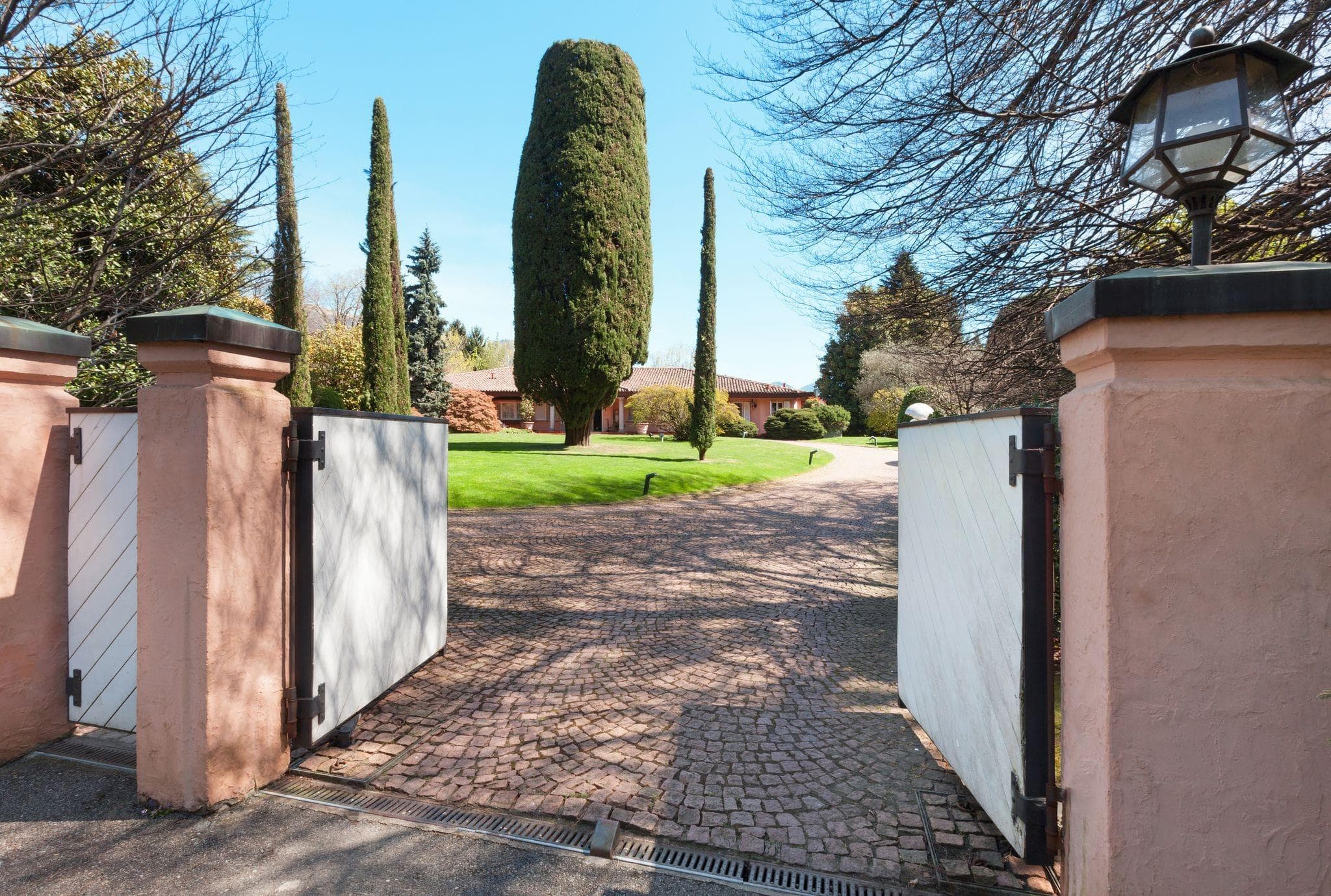 estate gates in beautiful white wood and steel