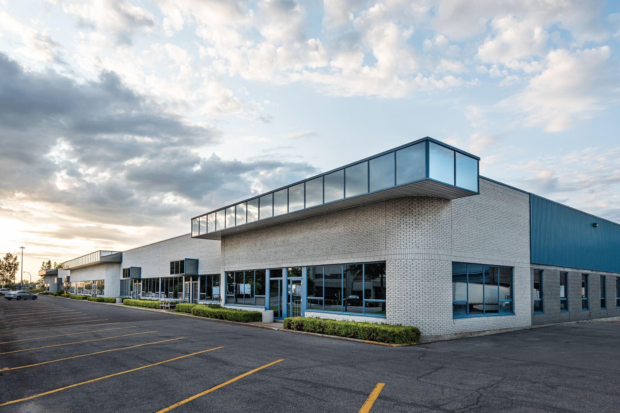 exterior of small business with glass automatic doors