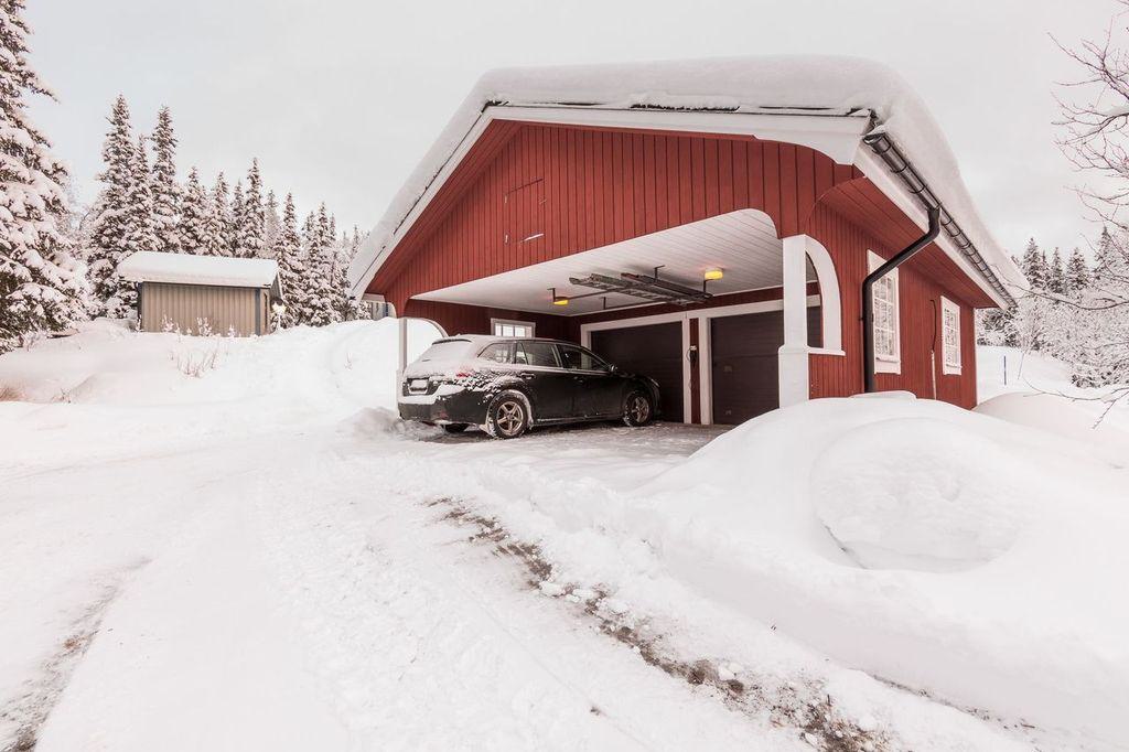 a garage addition to a home after a very heavy snowfall