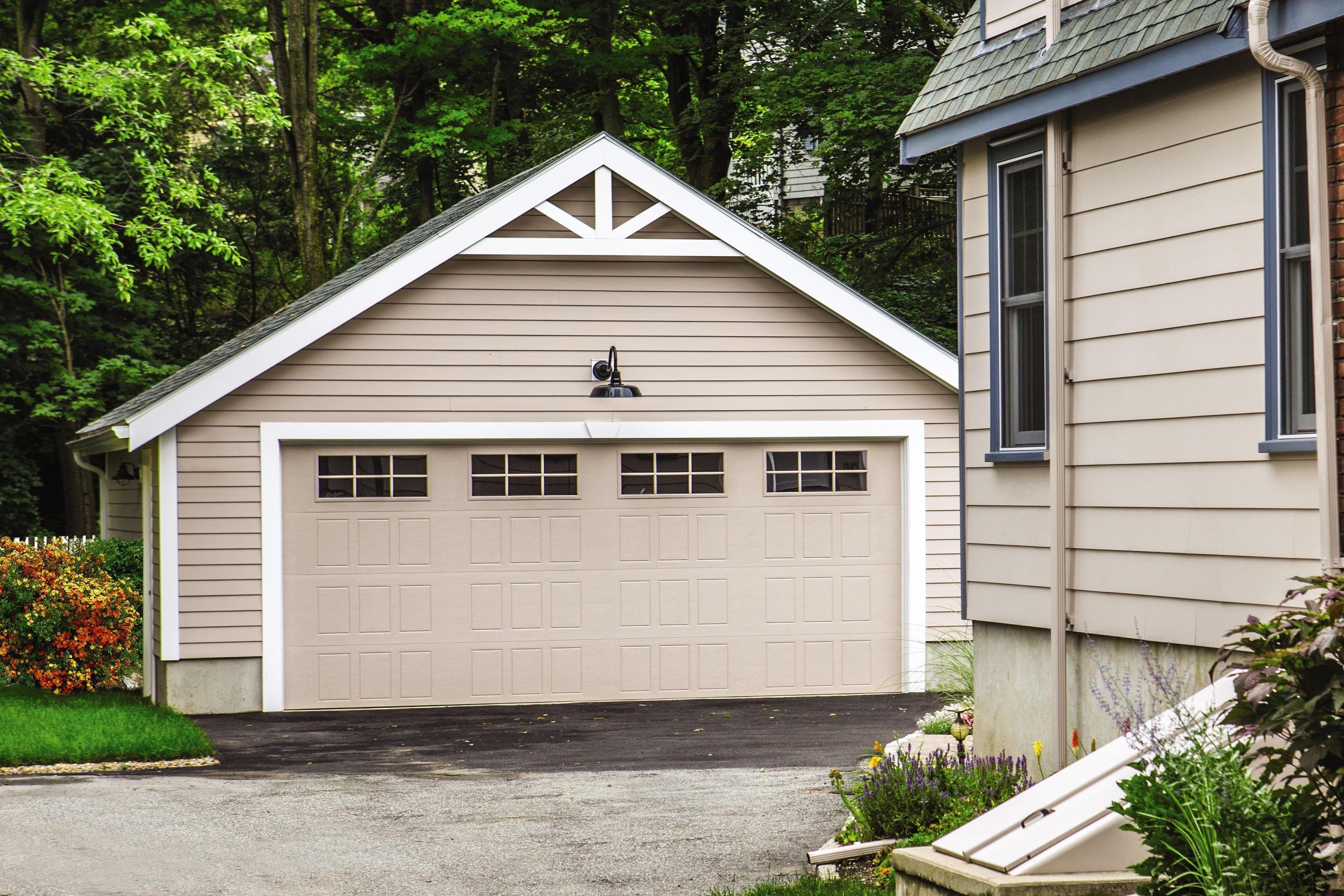 separate home addition garage with double garage doors