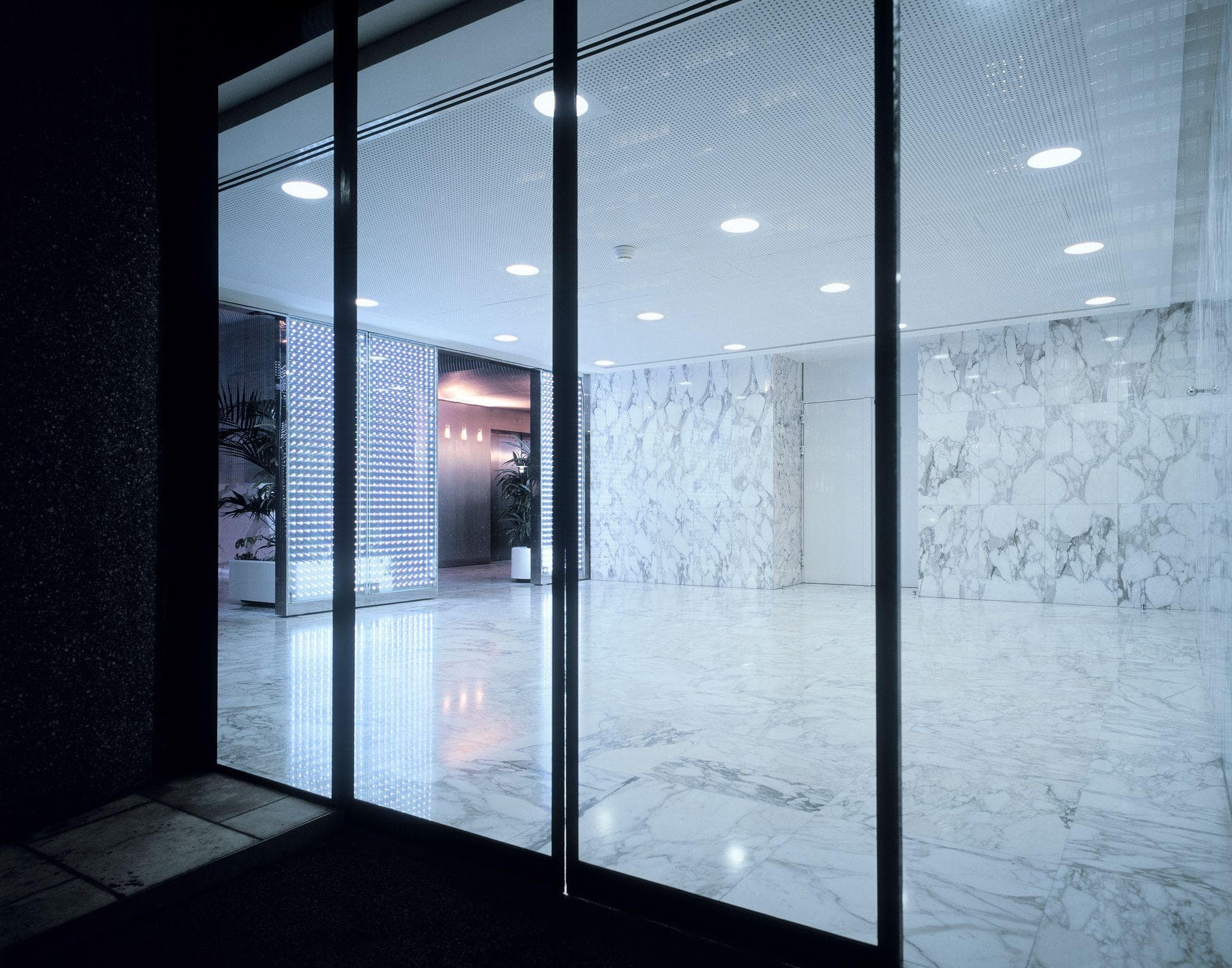 stylish modern glass sliding doors for front lobby