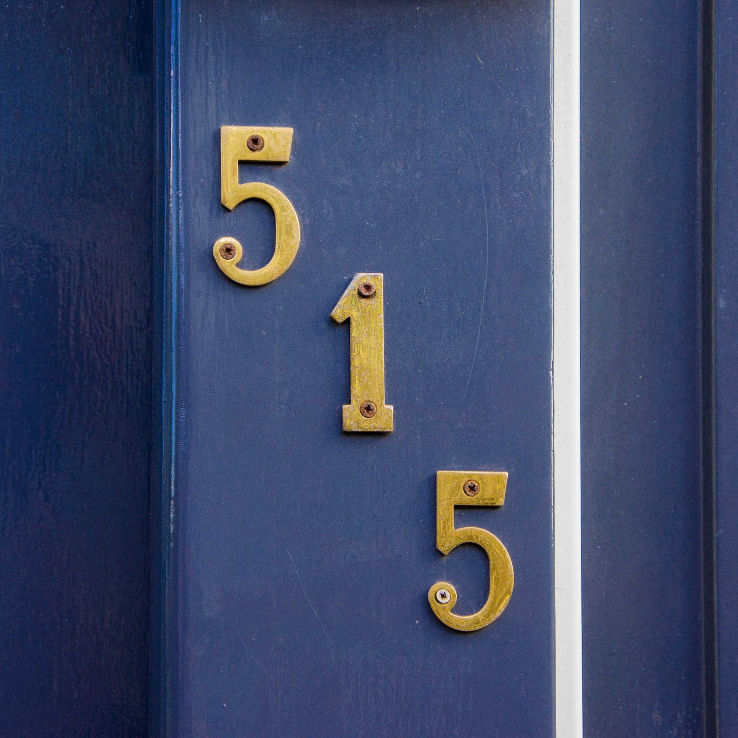 house number displayed on navy blue door trim house number displayed on navy blue door trim