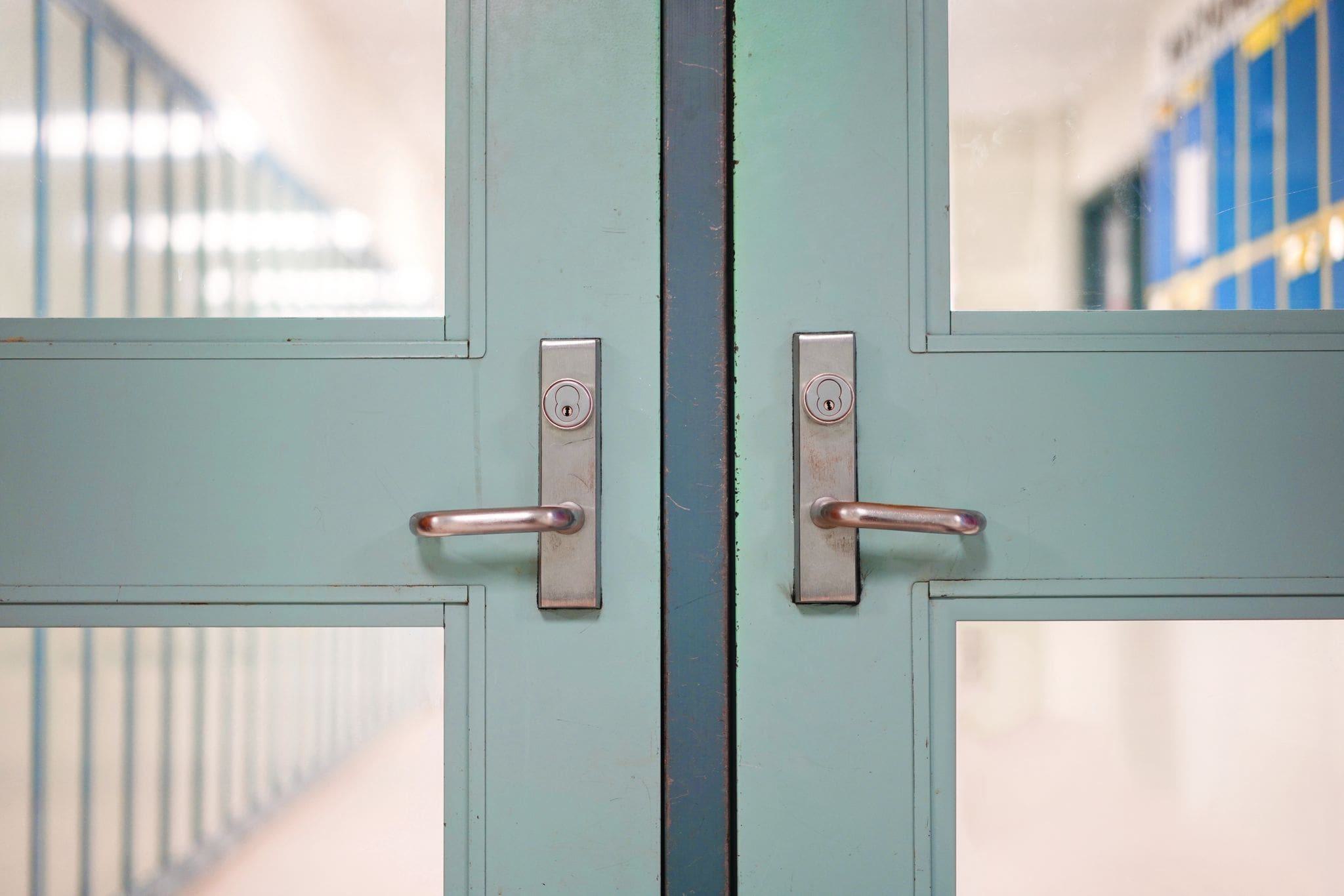 interior old pedestrian doors with lockers in background