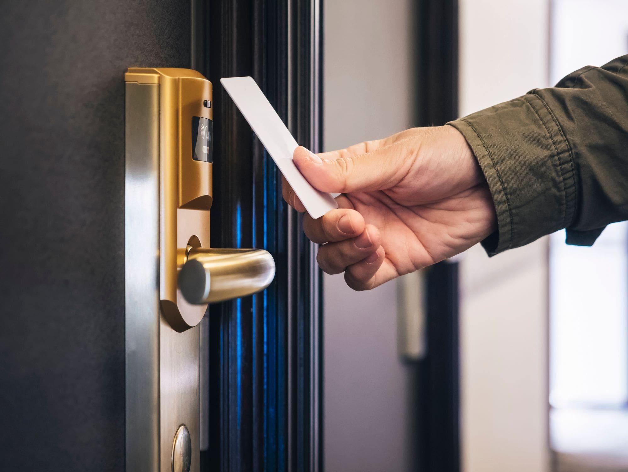 swiping keycard reader on door