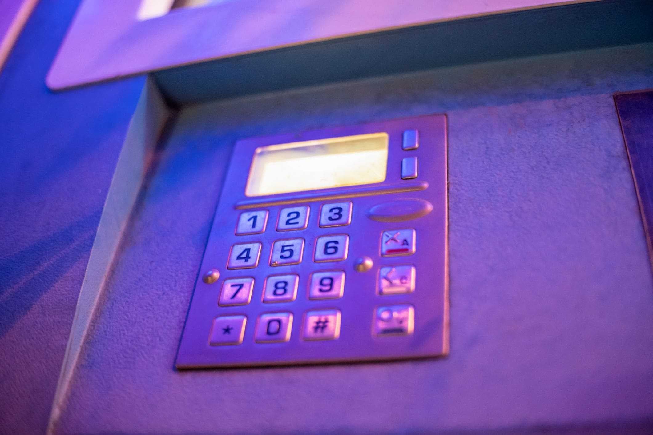 closeup of a keypad entry system for an automatic gate
