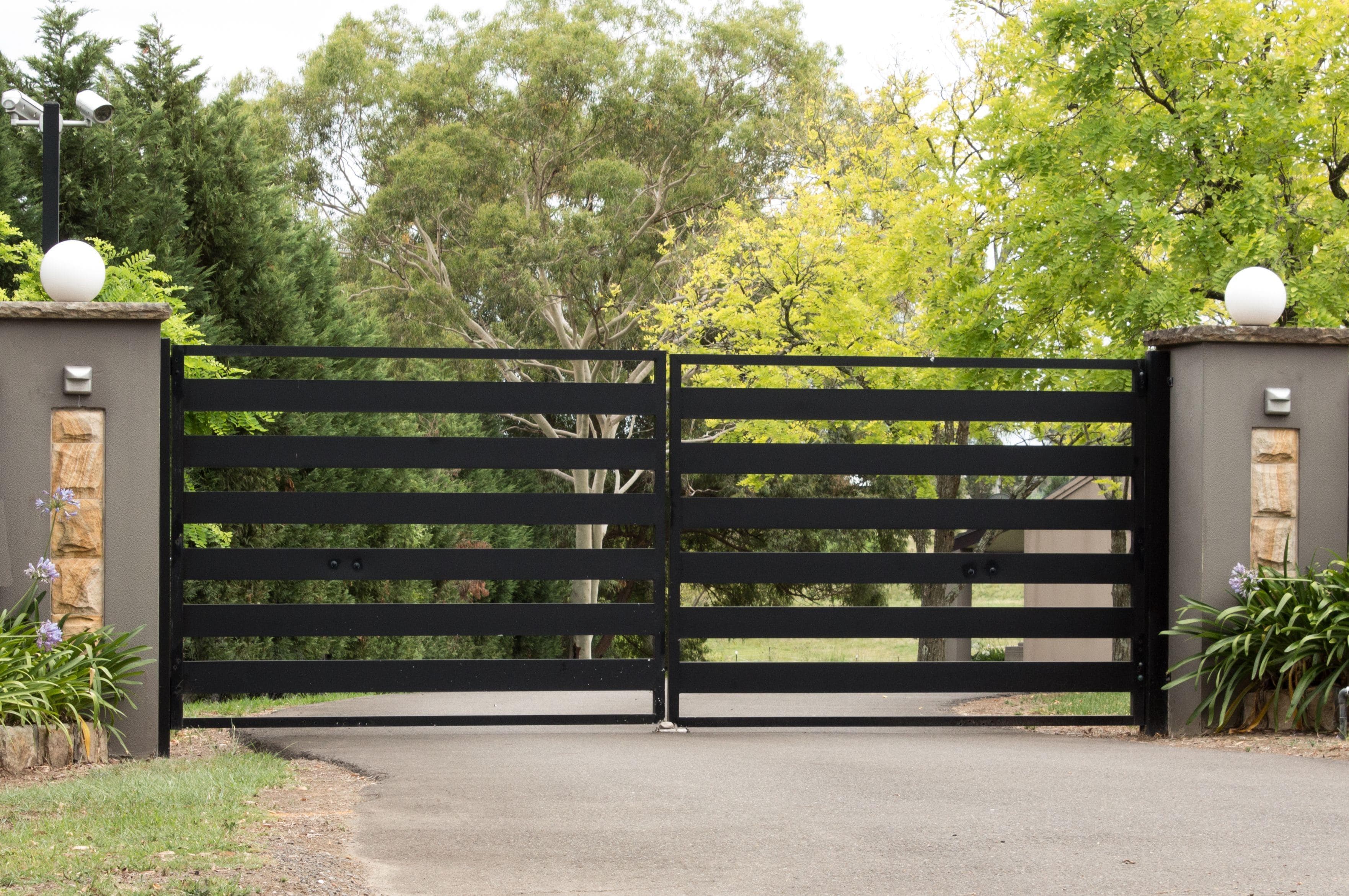 a modern black metallic slide gate in vancouver