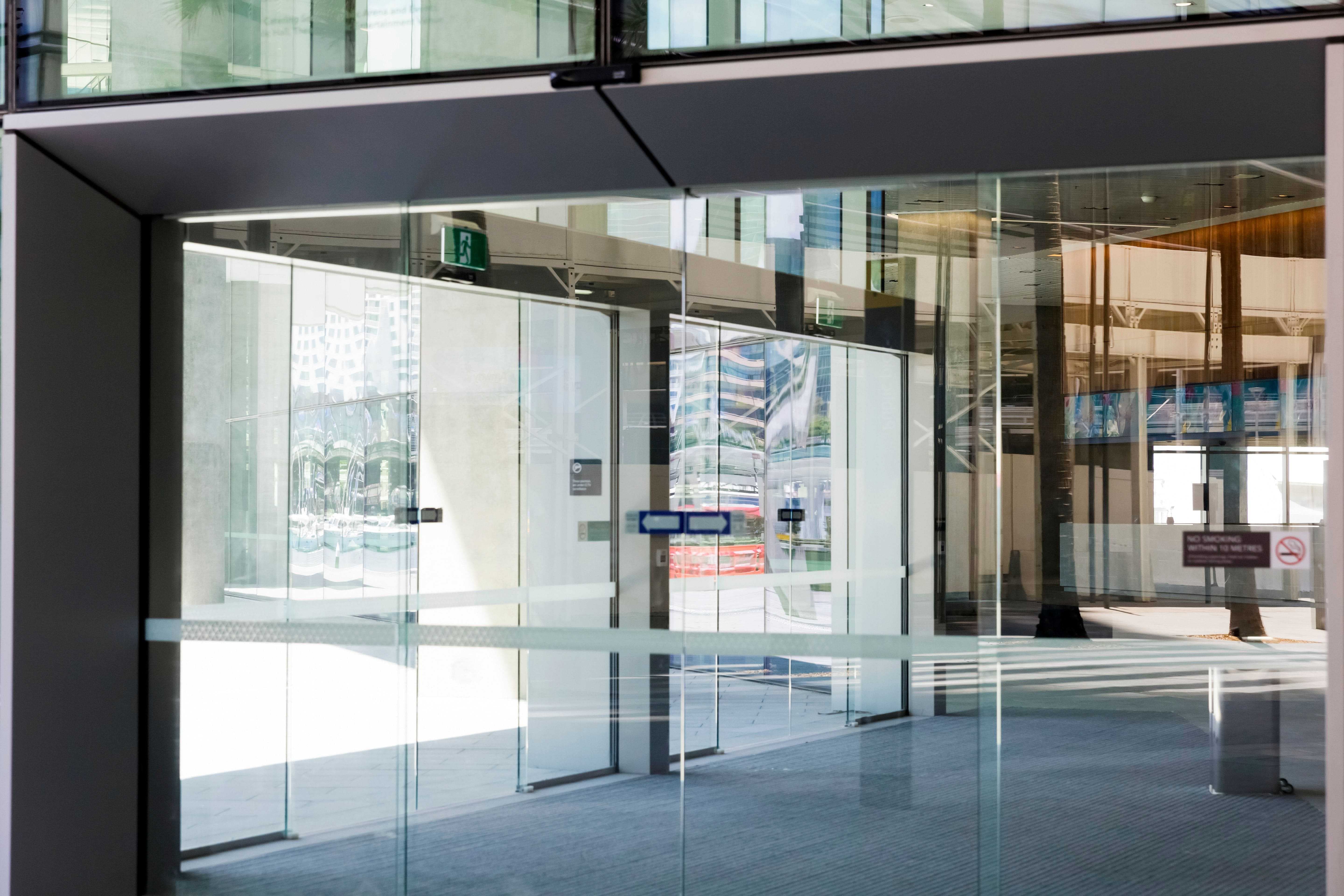 automatic glass doors in building lobby