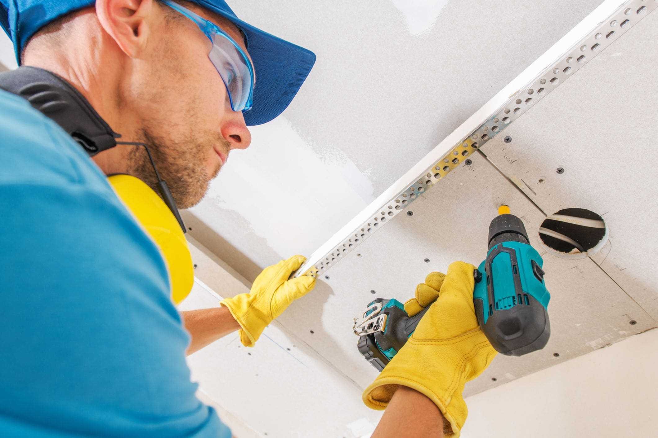 installing ceiling-mounted shelving inside garage