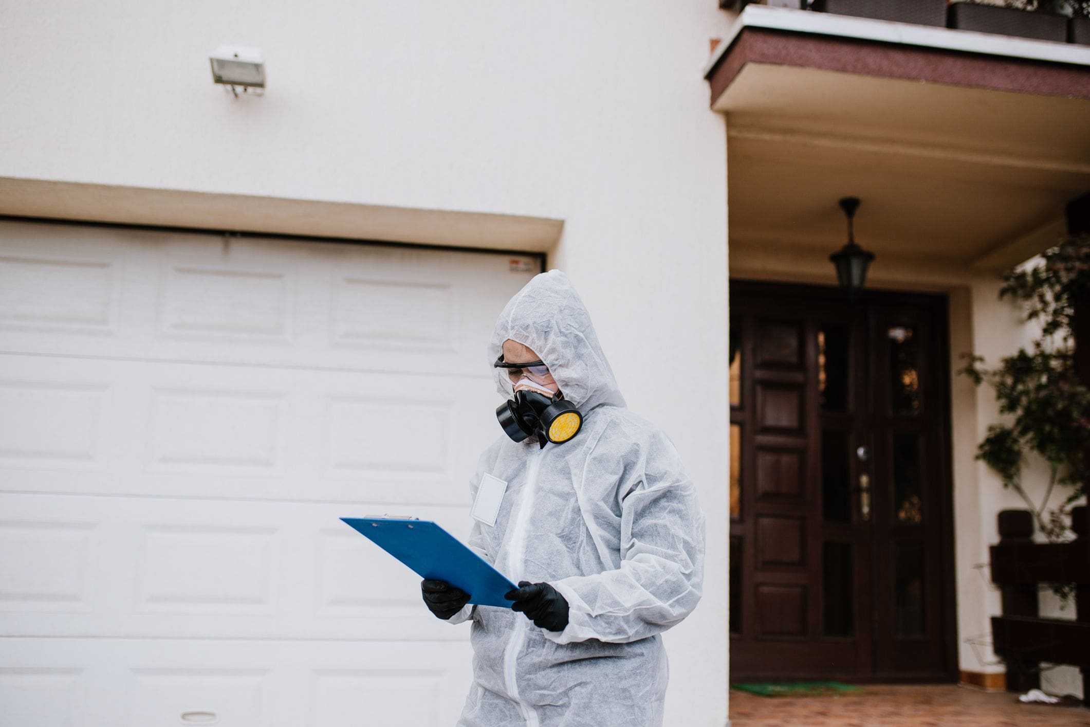 pest control inspector wearing protective gear