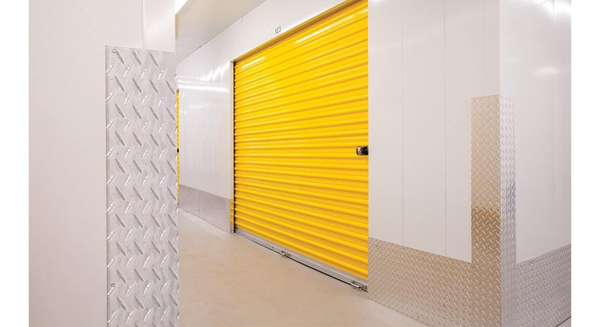 yellow wayne dalton door in a storage facility