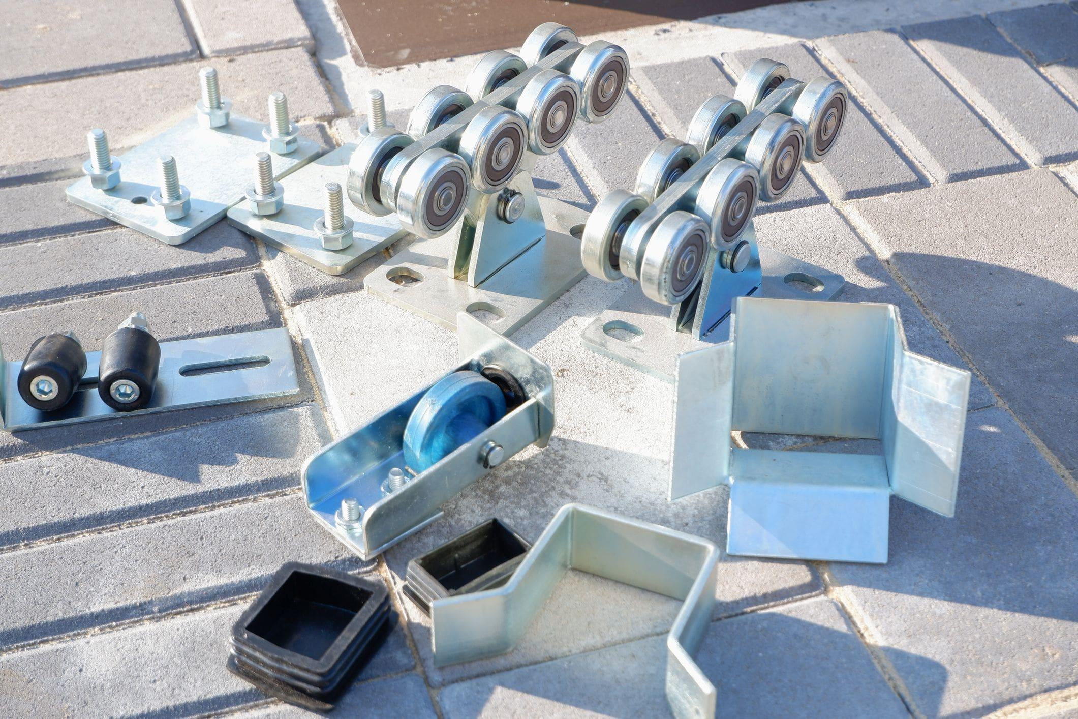 a selection of rollers and track fittings a selection of rollers and track fittings