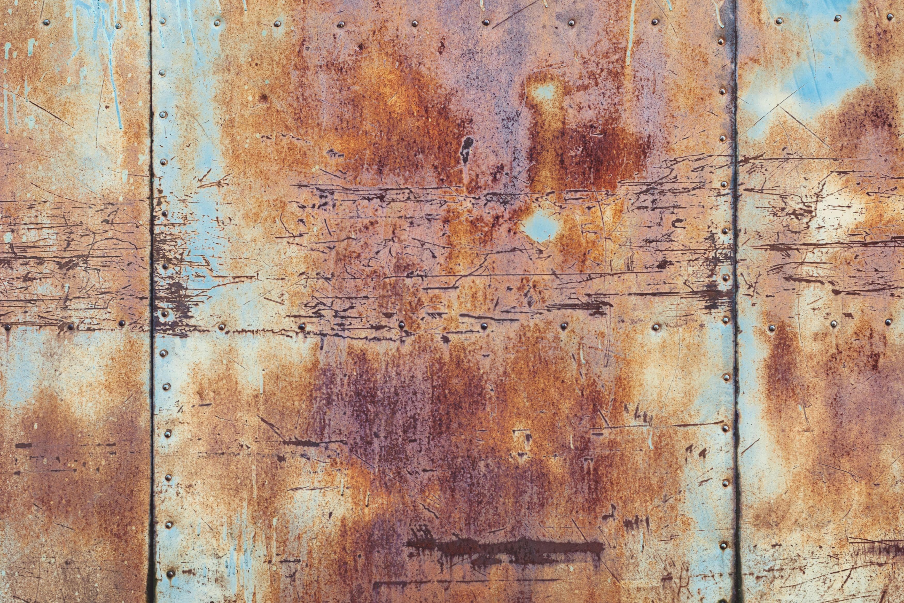 rusted panel of old sectional door