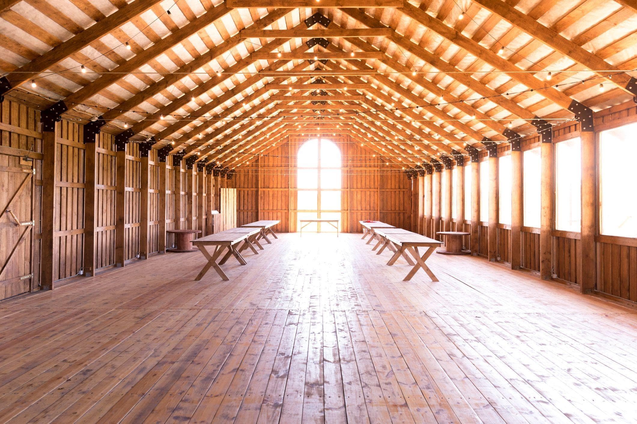 rustic wooden interior of a converted barn venue